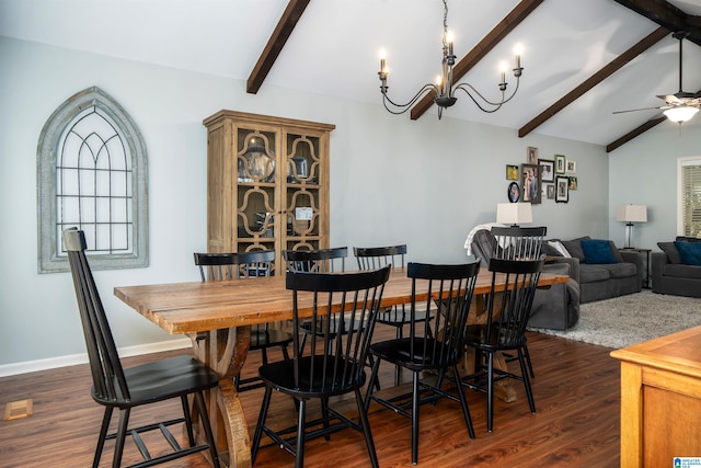 dining room with vaulted ceiling with beams, baseboards, dark wood-style flooring, and ceiling fan with notable chandelier