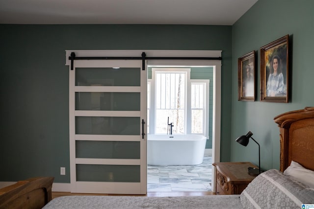 bedroom with a barn door