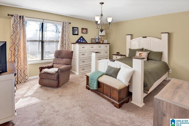 carpeted bedroom with baseboards and a notable chandelier