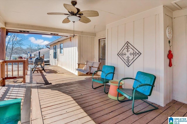 wooden deck with ceiling fan