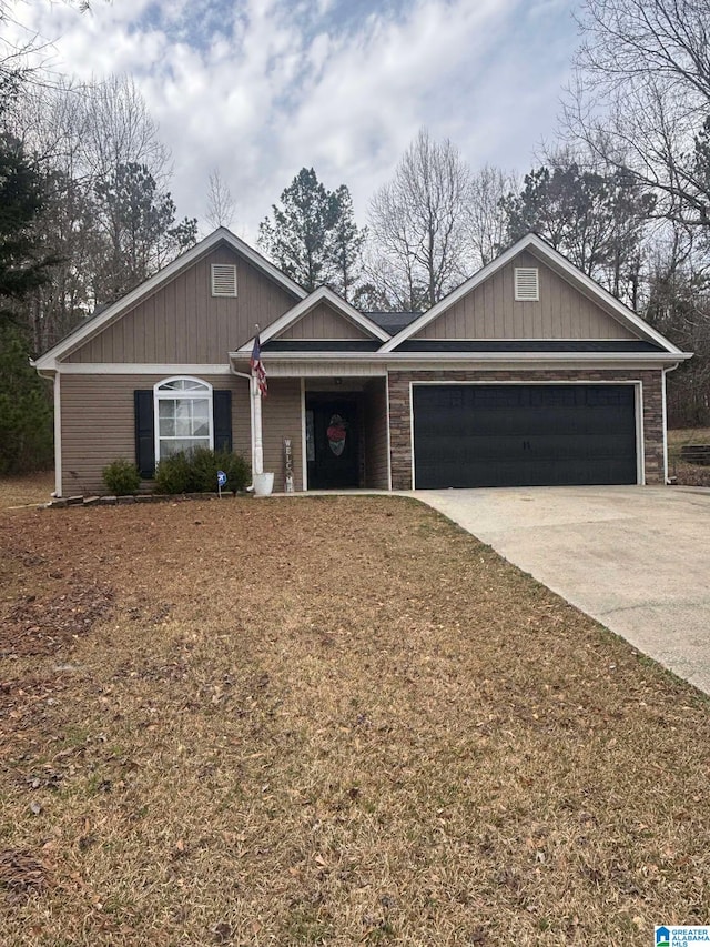 ranch-style house featuring a garage and concrete driveway