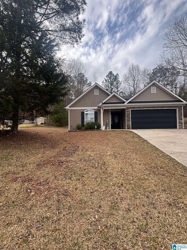 ranch-style house with concrete driveway and an attached garage