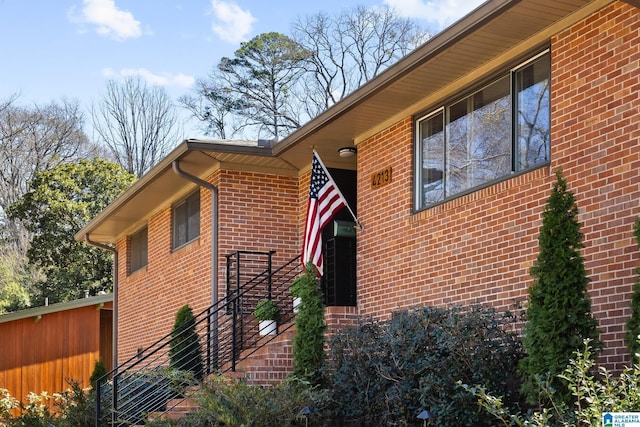 exterior space with brick siding