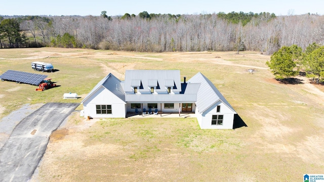 aerial view featuring a forest view