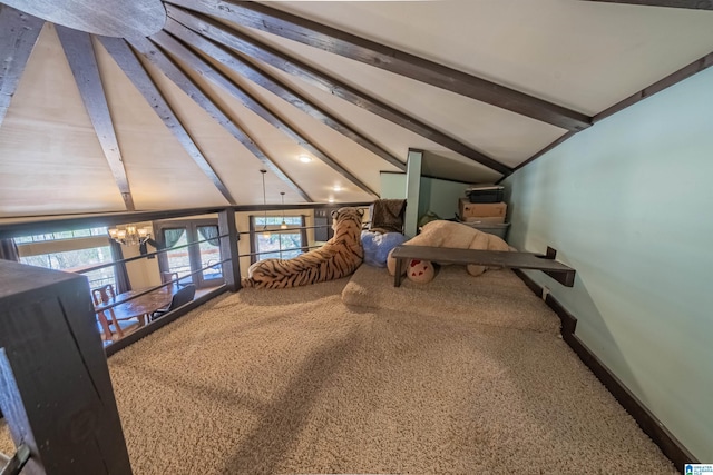 carpeted bedroom featuring vaulted ceiling with beams, a notable chandelier, and baseboards