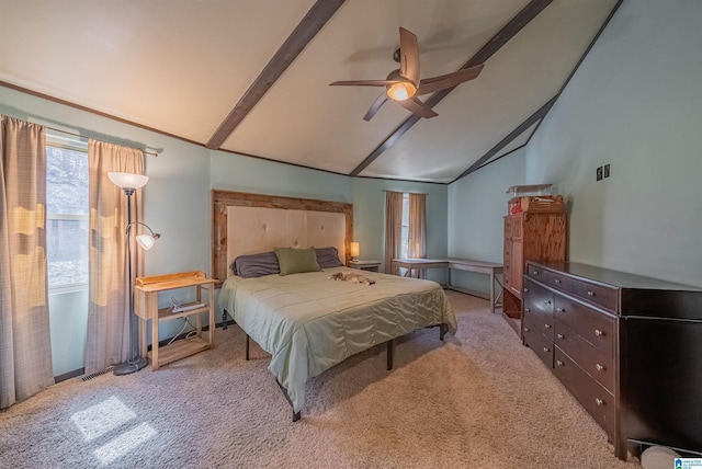 bedroom featuring carpet floors, visible vents, vaulted ceiling with beams, and ceiling fan