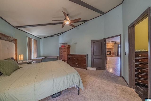 bedroom featuring vaulted ceiling, carpet floors, and ceiling fan