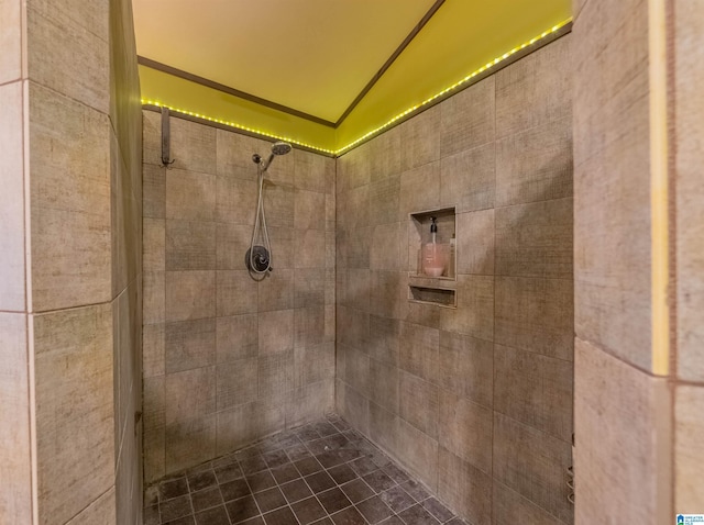 full bath with a tile shower