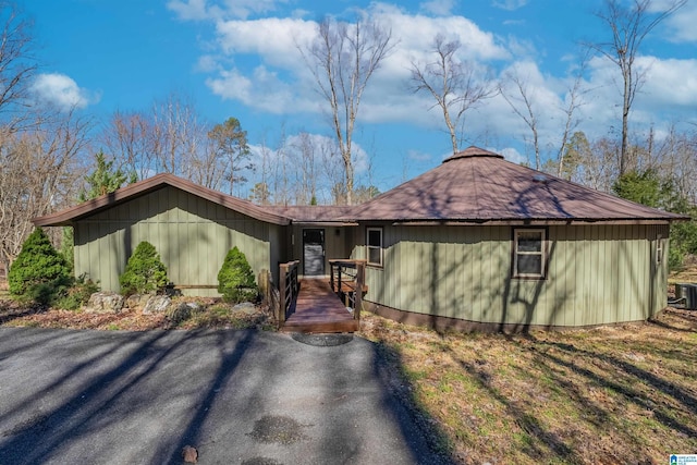 view of front of house with a wooden deck