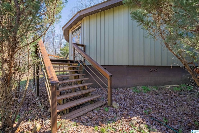 view of property exterior featuring stairway