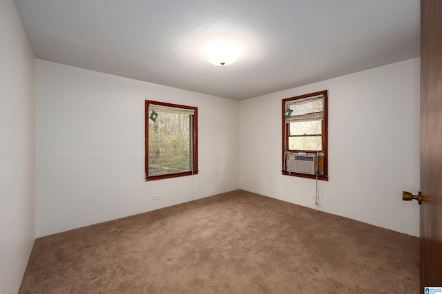 carpeted empty room featuring cooling unit