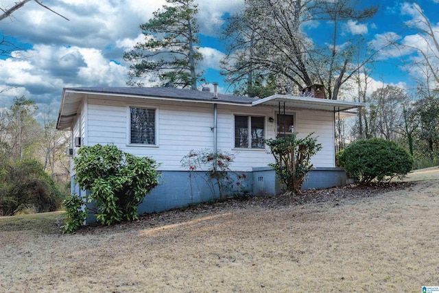 single story home with crawl space and a chimney