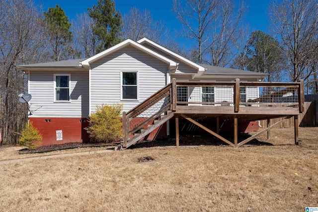 back of house with crawl space, stairway, a lawn, and a wooden deck