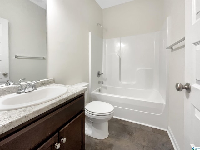 bathroom with tub / shower combination, vanity, and toilet