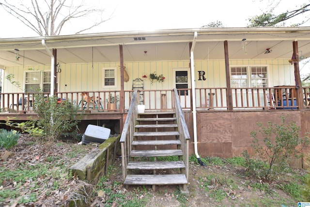 entrance to property with covered porch