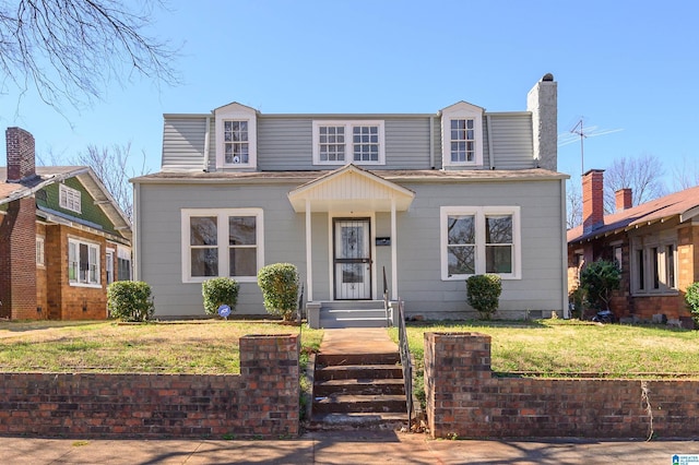 view of front facade featuring a front yard