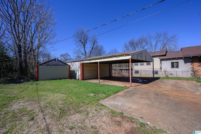 exterior space with an outbuilding and fence