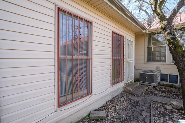 view of exterior entry featuring cooling unit