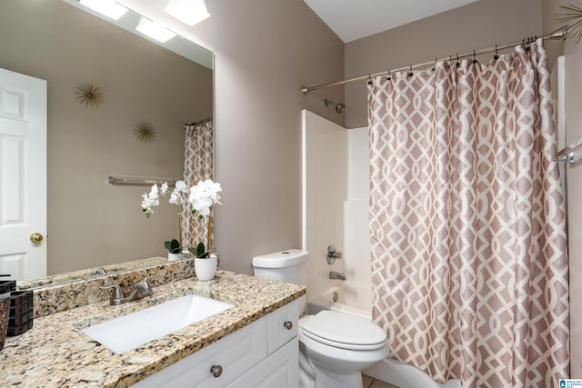 full bathroom with shower / tub combo, vanity, and toilet