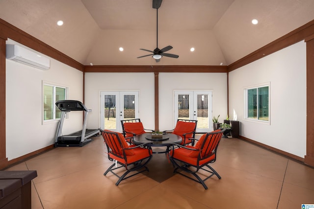 view of patio / terrace with a wall unit AC, ceiling fan, and french doors