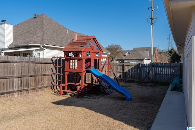 view of playground featuring a fenced backyard