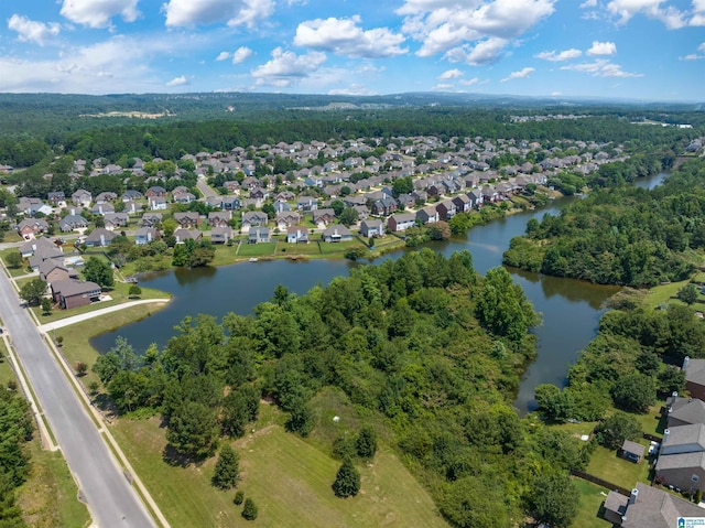 birds eye view of property featuring a residential view and a water view