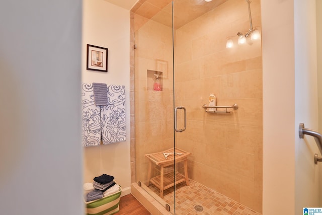 bathroom with a stall shower