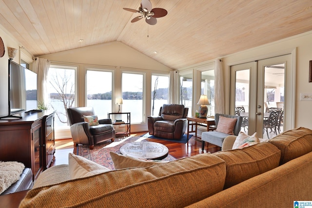 living room featuring wooden ceiling, a water view, wood finished floors, vaulted ceiling, and french doors