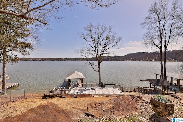 view of water feature with a dock