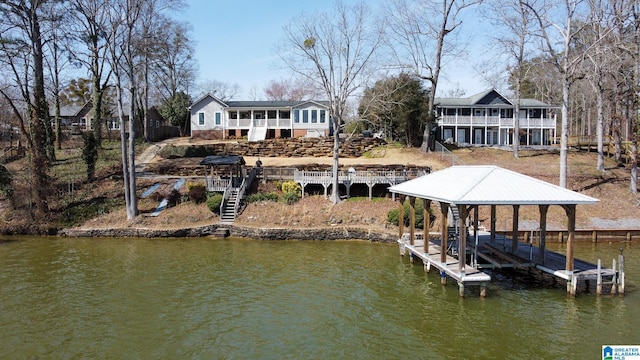 view of dock with a water view and stairs