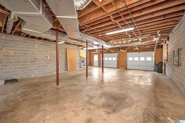 garage featuring concrete block wall