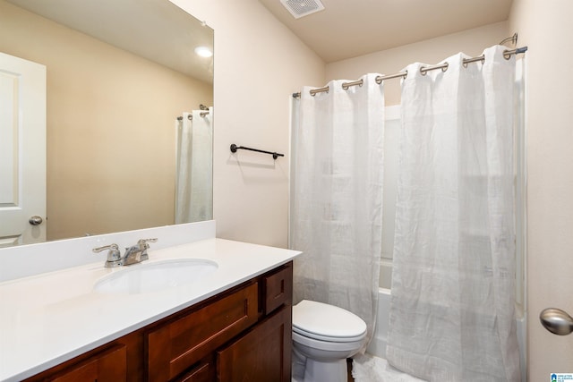 full bathroom featuring visible vents, shower / bath combination with curtain, toilet, and vanity