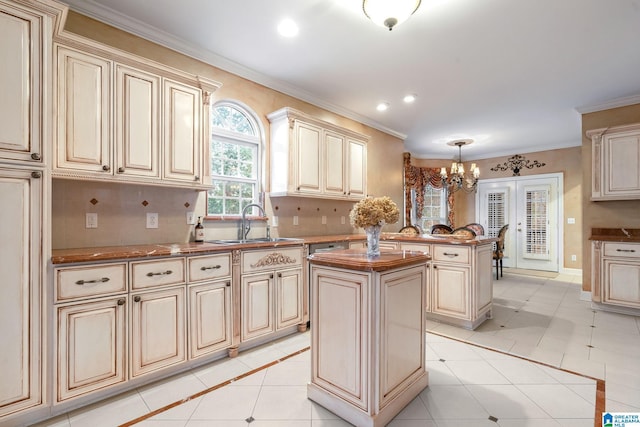 kitchen featuring cream cabinets