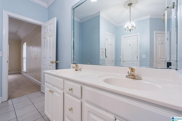 full bathroom with crown molding, a chandelier, and a sink