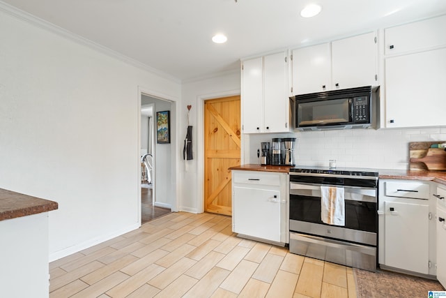 kitchen featuring electric range, decorative backsplash, black microwave, and white cabinetry