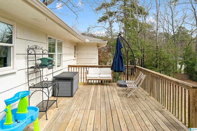 deck with outdoor lounge area