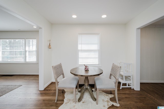 dining room featuring visible vents, recessed lighting, wood finished floors, and baseboards