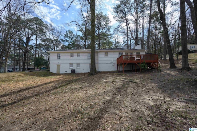 rear view of property with a deck