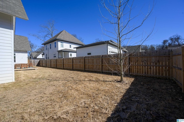 view of yard featuring a fenced backyard