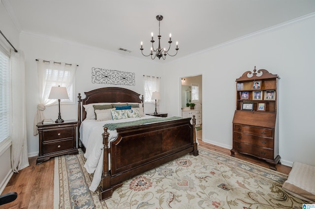 bedroom featuring visible vents, crown molding, baseboards, a chandelier, and light wood-type flooring