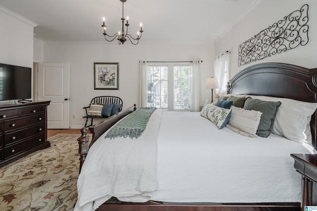 bedroom featuring an inviting chandelier, light wood-type flooring, and ornamental molding