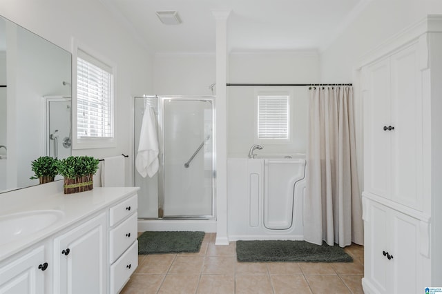 bathroom with tile patterned flooring, visible vents, ornamental molding, a stall shower, and vanity