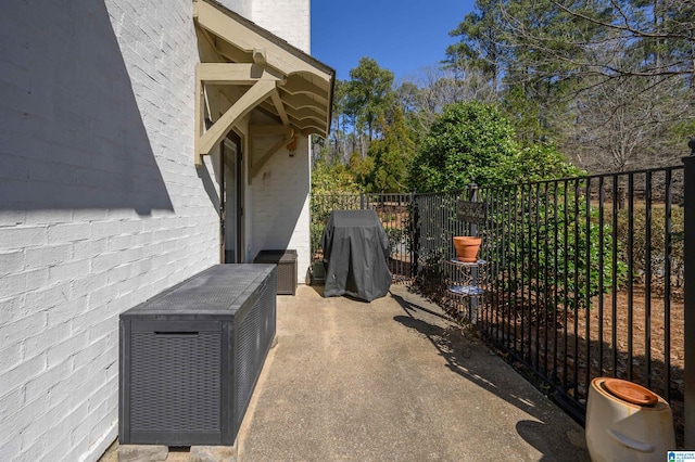 view of patio with fence