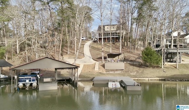 view of dock featuring a water view and boat lift