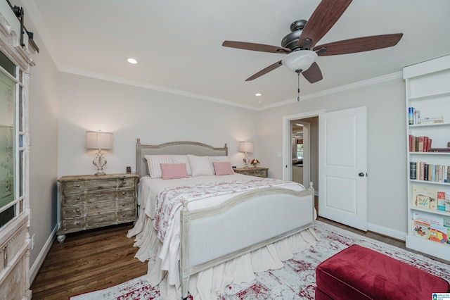 bedroom with crown molding, recessed lighting, wood finished floors, and baseboards