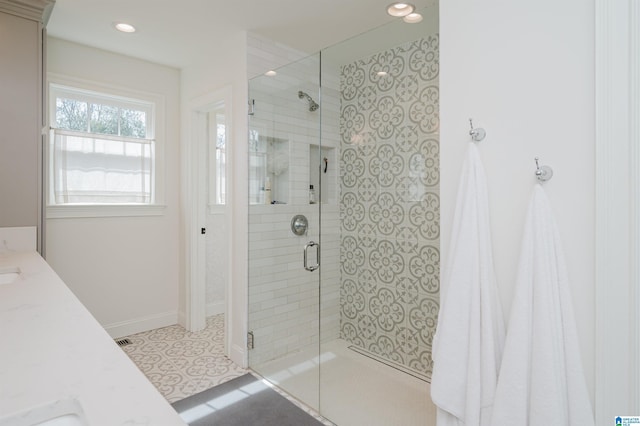 full bath featuring vanity, recessed lighting, and a stall shower