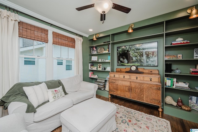 living room featuring wood finished floors and a ceiling fan