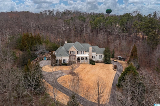 drone / aerial view with a forest view