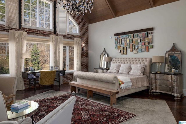 bedroom featuring high vaulted ceiling, brick wall, wood ceiling, and an inviting chandelier