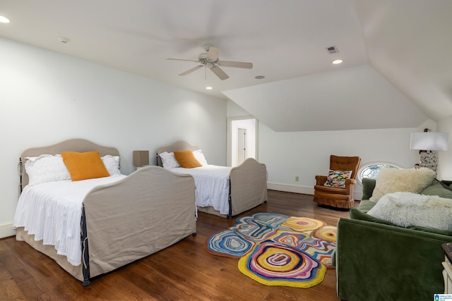 bedroom with lofted ceiling, recessed lighting, wood finished floors, and visible vents